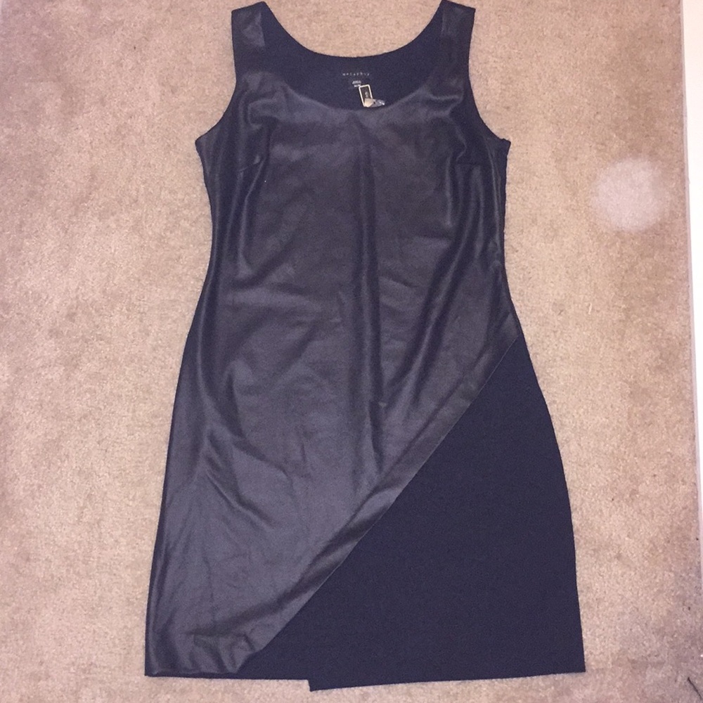 Black faux leather dress w/ crossover hem.